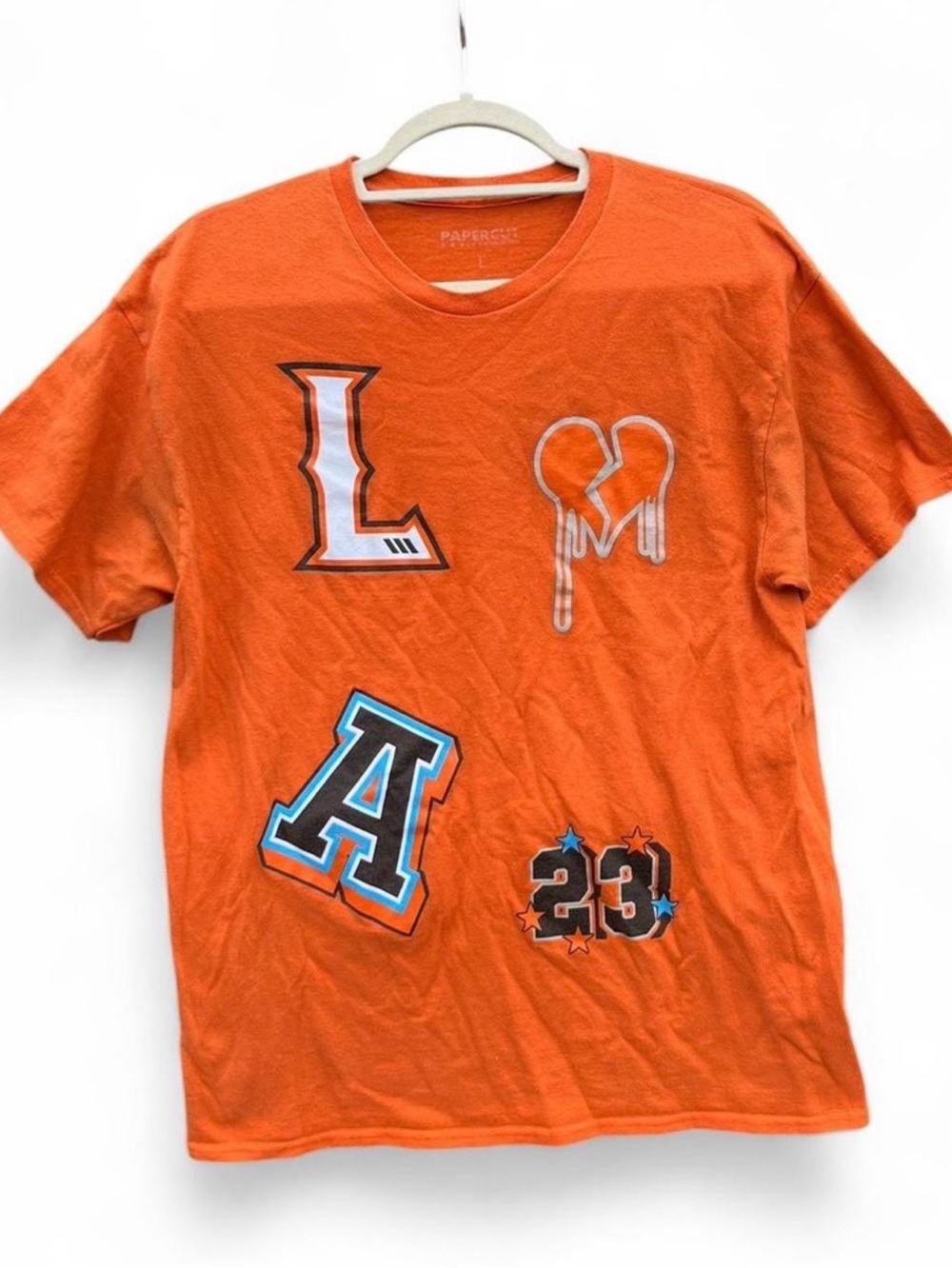 paper tee Orange Graphic Short Sleeve Tee with Blue & Black Accents